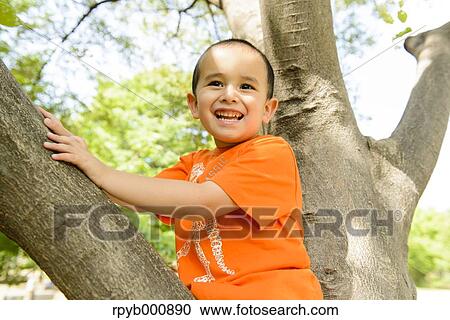 Young Japanese kid playing in a park View Large Photo Image Stock Image - Young Japanese kid playing in a park. Fotosearch