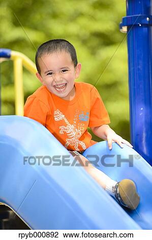 Young Japanese kid playing in a park View Large Photo Image Stock Image - Young Japanese kid playing in a park. Fotosearch