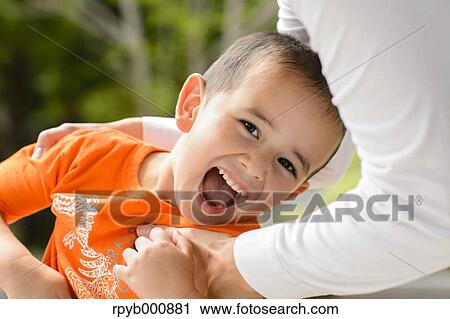 Young Japanese kid with his mum in a park View Large Photo Image Stock Image - Young Japanese kid with his mum in a park. Fotosearch