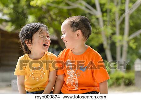 Young Japanese kids playing in a park View Large Photo Image Picture - Young Japanese kids playing in a park. Fotosearch