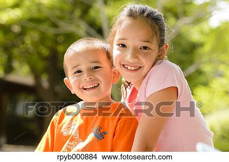 Young Japanese kids playing in a park View Large Photo Image Picture - Young Japanese kids playing in a park. Fotosearch