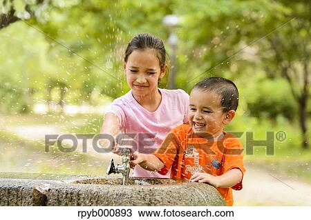 Young Japanese kids playing in a park View Large Photo Image Stock Image - Young Japanese kids playing in a park. Fotosearch