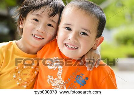 Young Japanese kids playing in a park View Large Photo Image Stock Photo - Young Japanese kids playing in a park. Fotosearch