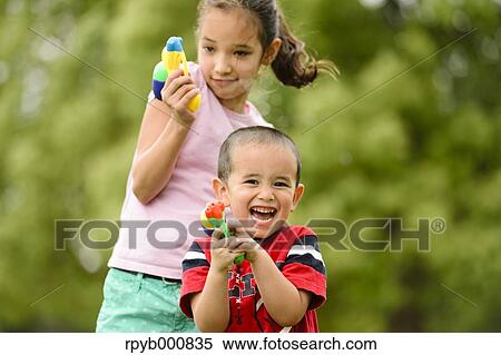 Young Japanese kids playing in a park View Large Photo Image Stock Photography - Young Japanese kids playing in a park. Fotosearch