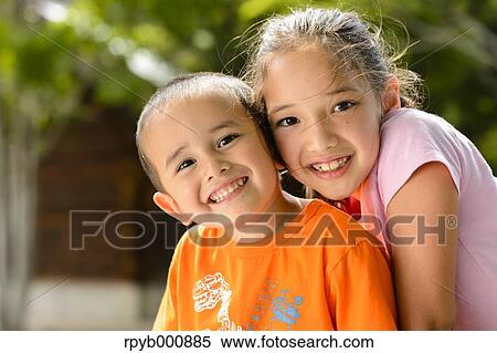 Young Japanese kids playing in a park View Large Photo Image Stock Photography - Young Japanese kids playing in a park. Fotosearch