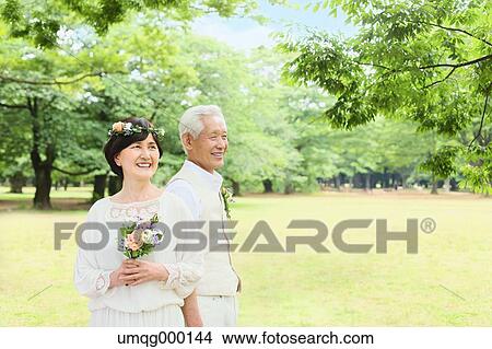 Senior adult Japanese couple in a park View Large Photo Image Picture - Senior adult Japanese couple in a park. Fotosearch