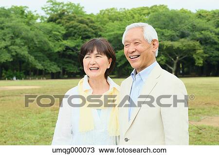Senior adult Japanese couple in a park View Large Photo Image Stock Image - Senior adult Japanese couple in a park. Fotosearch