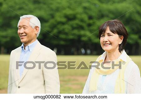 Senior adult Japanese couple in a park View Large Photo Image Stock Image - Senior adult Japanese couple in a park. Fotosearch