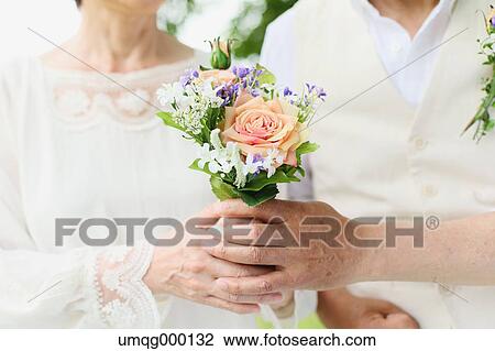 Senior adult Japanese couple in a park View Large Photo Image Stock Image - Senior adult Japanese couple in a park. Fotosearch