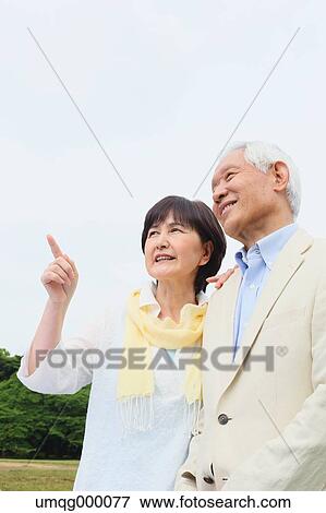 Senior adult Japanese couple in a park View Large Photo Image Stock Photo - Senior adult Japanese couple in a park. Fotosearch