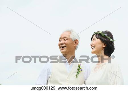 Senior adult Japanese couple in a park View Large Photo Image Stock Photo - Senior adult Japanese couple in a park. Fotosearch