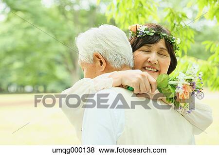 Senior adult Japanese couple in a park View Large Photo Image Stock Photo - Senior adult Japanese couple in a park. Fotosearch