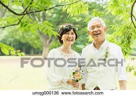 Senior adult Japanese couple in a park View Large Photo Image Stock Photograph - Senior adult Japanese couple in a park. Fotosearch