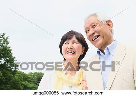Senior adult Japanese couple in a park View Large Photo Image Stock Photography - Senior adult Japanese couple in a park. Fotosearch