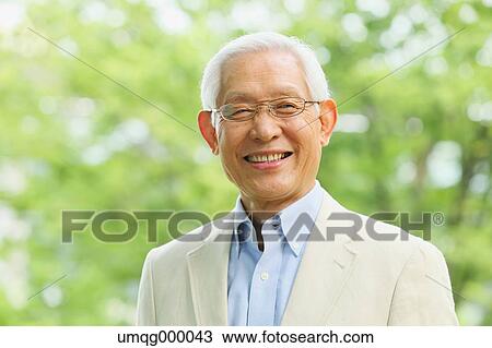 Senior adult Japanese man in a park View Large Photo Image Stock Image - Senior adult Japanese man in a park. Fotosearch