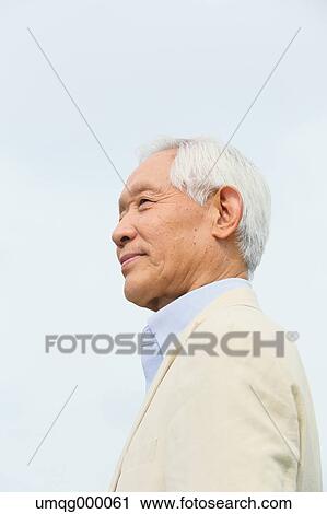 Senior adult Japanese man in a park View Large Photo Image Stock Image - Senior adult Japanese man in a park. Fotosearch