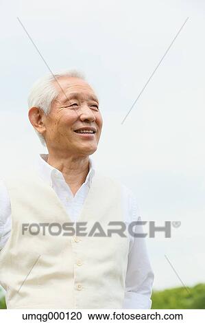 Senior adult Japanese man in a park View Large Photo Image Stock Image - Senior adult Japanese man in a park. Fotosearch