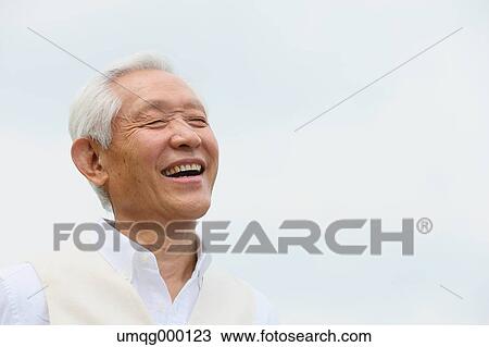 Senior adult Japanese man in a park View Large Photo Image Stock Image - Senior adult Japanese man in a park. Fotosearch