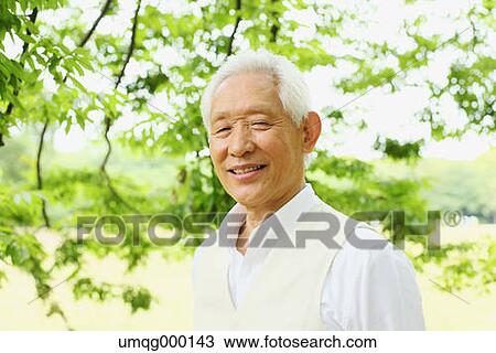 Senior adult Japanese man in a park View Large Photo Image Stock Image - Senior adult Japanese man in a park. Fotosearch