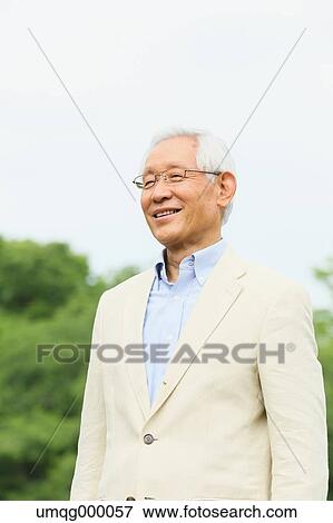 Senior adult Japanese man in a park View Large Photo Image Stock Photo - Senior adult Japanese man in a park. Fotosearch