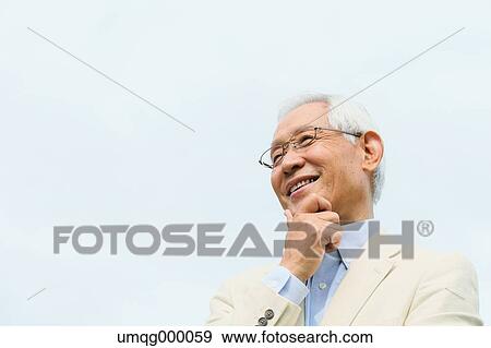 Senior adult Japanese man in a park View Large Photo Image Stock Photo - Senior adult Japanese man in a park. Fotosearch
