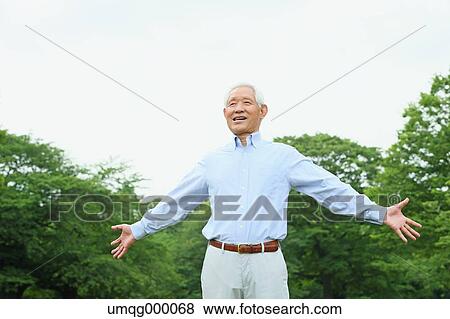 Senior adult Japanese man in a park View Large Photo Image Stock Photo - Senior adult Japanese man in a park. Fotosearch