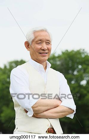 Senior adult Japanese man in a park View Large Photo Image Stock Photo - Senior adult Japanese man in a park. Fotosearch