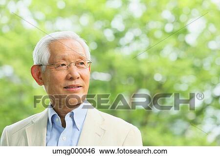 Senior adult Japanese man in a park View Large Photo Image Stock Photograph - Senior adult Japanese man in a park. Fotosearch