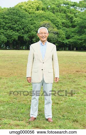 Stock Photograph - Senior adult Japanese man in a park. Fotosearch