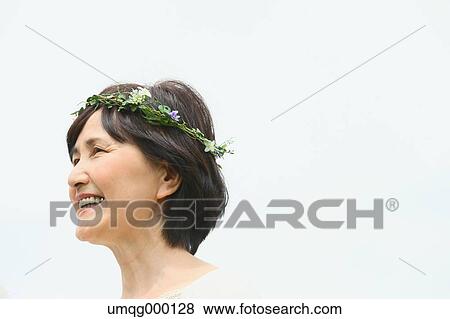 Senior adult Japanese woman in a park View Large Photo Image Stock Photo - Senior adult Japanese woman in a park. Fotosearch