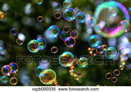 Soap bubbles in a park View Large Photo Image Stock Photography - Soap bubbles in a park. Fotosearch