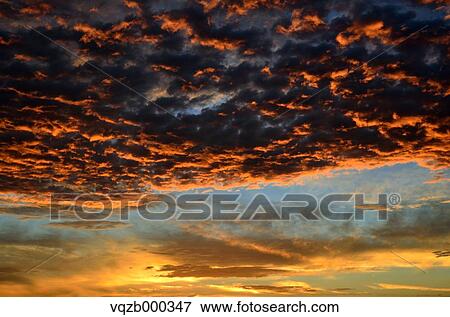 Stock Photo - Sunset clouds. Fotosearch