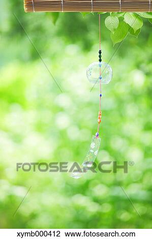 Wind chime in a park View Large Photo Image Stock Image - Wind chime in a park. Fotosearch