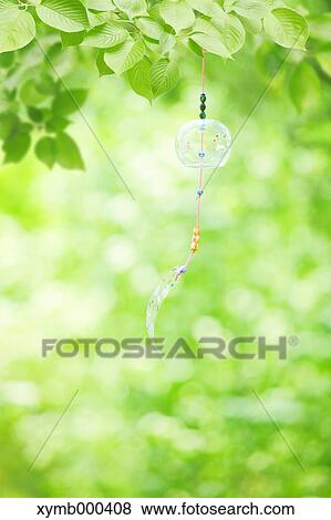 Wind chime in a park View Large Photo Image Stock Photo - Wind chime in a park. Fotosearch