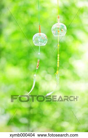 Wind chimes in a park View Large Photo Image Picture - Wind chimes in a park. Fotosearch