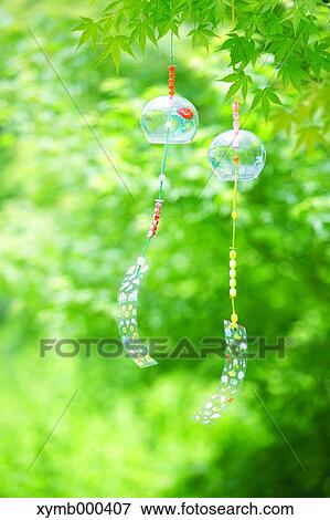 Stock Photo - Wind chimes in a park. Fotosearch