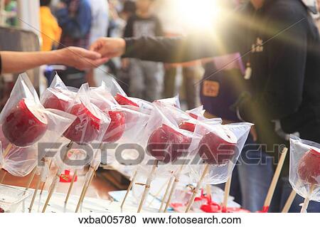Stock Image - Apple candies at traditional Japanese festival. Fotosearch