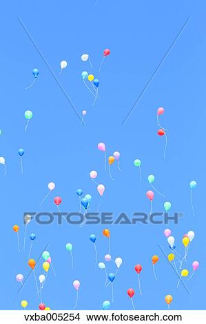 Balloons And Blue Sky View Large Photo Image Picture - Balloons And Blue Sky. Fotosearch