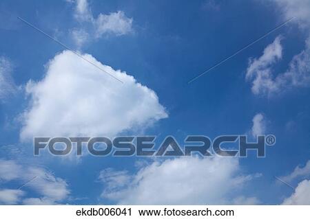 Blue sky with clouds View Large Photo Image Stock Image - Blue sky with clouds. Fotosearch