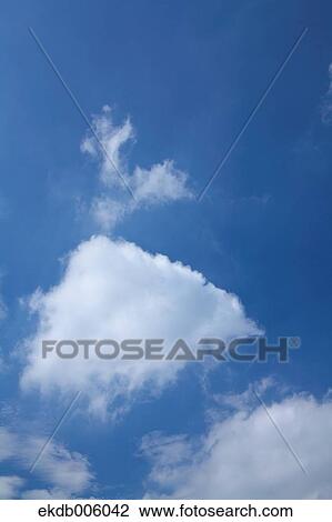Blue sky with clouds View Large Photo Image Stock Image - Blue sky with clouds. Fotosearch