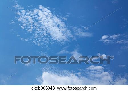 Stock Image - Blue sky with clouds. Fotosearch