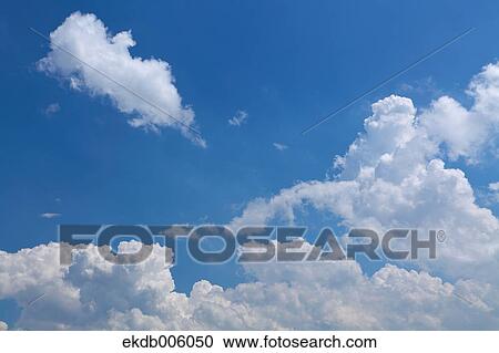 Blue sky with clouds View Large Photo Image Stock Image - Blue sky with clouds. Fotosearch