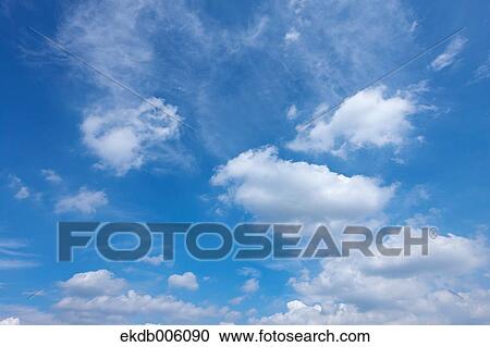 Blue sky with clouds View Large Photo Image Stock Image - Blue sky with clouds. Fotosearch