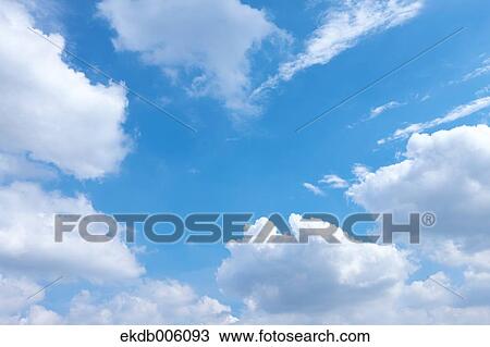 Blue sky with clouds View Large Photo Image Stock Image - Blue sky with clouds. Fotosearch