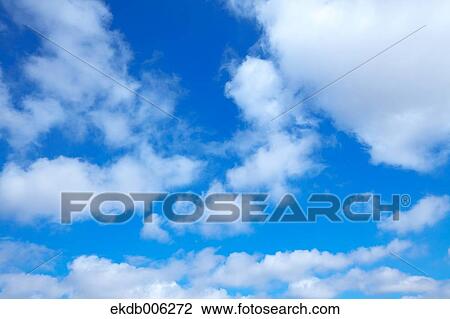 Blue sky with clouds View Large Photo Image Stock Image - Blue sky with clouds. Fotosearch