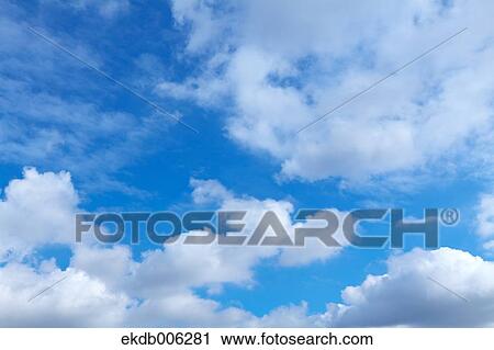 Blue sky with clouds View Large Photo Image Stock Image - Blue sky with clouds. Fotosearch