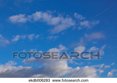 Blue sky with clouds View Large Photo Image Stock Image - Blue sky with clouds. Fotosearch