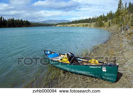 Picture - Canoe By The River. Fotosearch