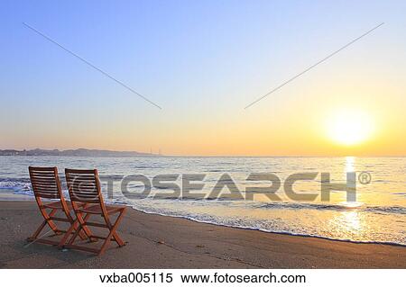 Chairs At The Beach At Sunset View Large Photo Image Stock Photography - Chairs At The Beach At Sunset. Fotosearch
