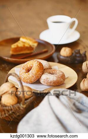 Coffee And Pastry On Wooden Table View Large Photo Image Stock Image - Coffee And Pastry On Wooden Table. Fotosearch